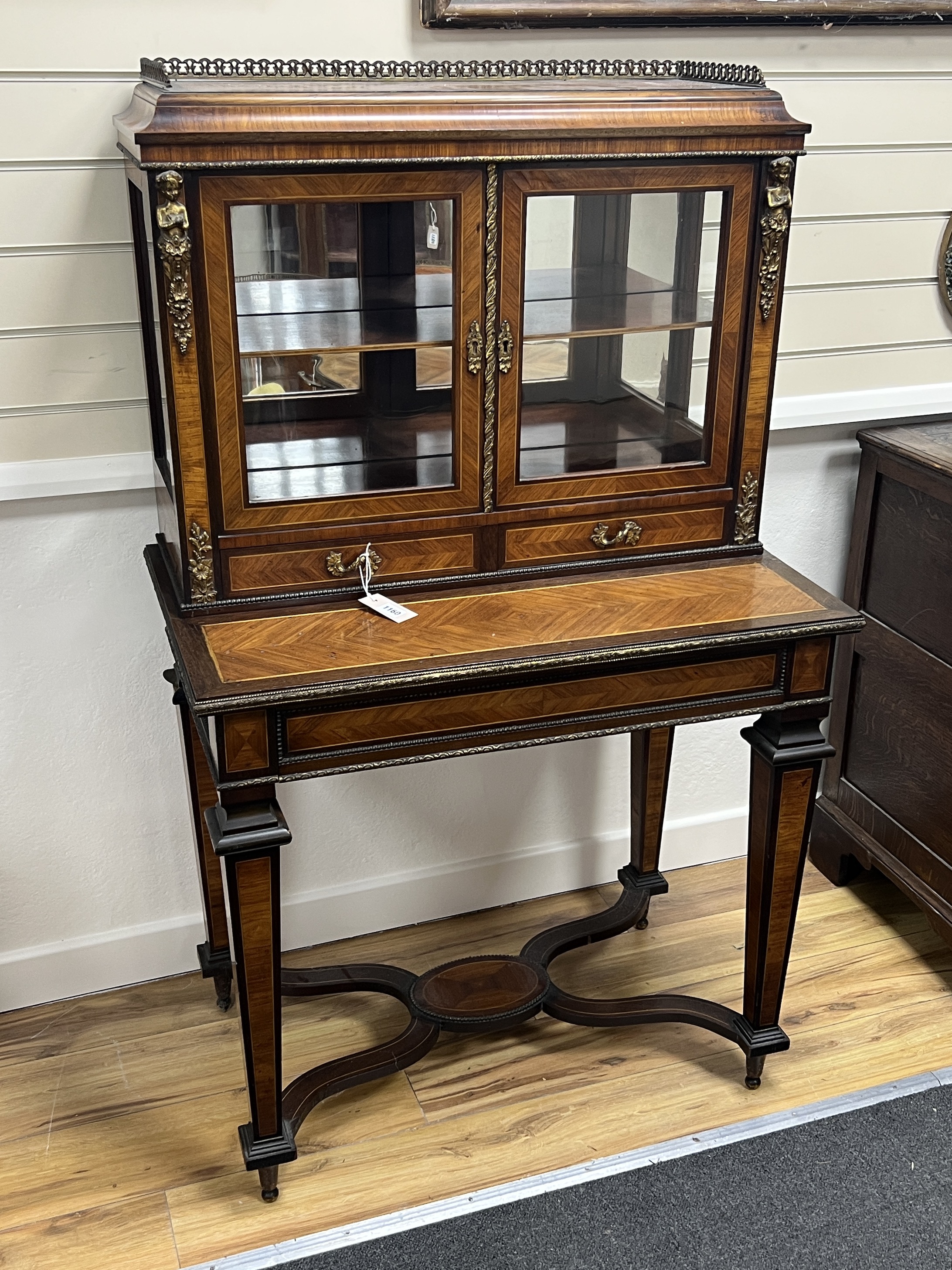 A French kingwood and gilt metal mounted side cabinet, width 82cm, depth 51cm, height 136cm